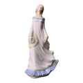 Figura femenina de porcelana
